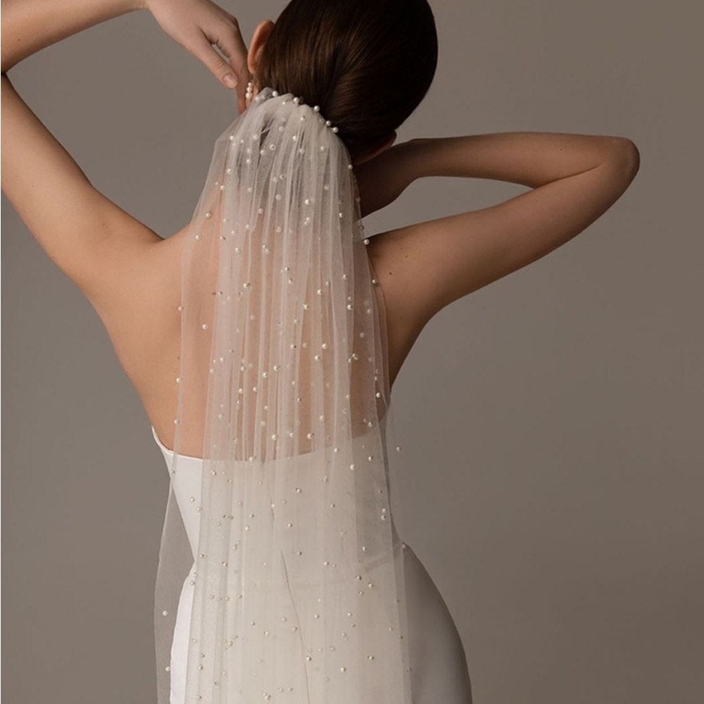 Pearl studded fingertip length veil